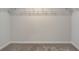 Walk in closet with carpet and wire shelving at 706 Bristol Dr, Loganville, GA 30052