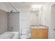 Well-lit bathroom featuring a shower-tub, granite vanity, and neutral color palette at 361 17Th Nw St # 922, Atlanta, GA 30363