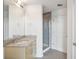 Contemporary bathroom with a tiled shower and granite-topped vanity area at 361 17Th Nw St # 922, Atlanta, GA 30363