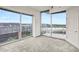 Bedroom with large windows and balcony access at 361 17Th Nw St # 922, Atlanta, GA 30363