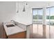 Open kitchen featuring pendant lighting, stainless sink, and expansive windows with bright natural light at 361 17Th Nw St # 922, Atlanta, GA 30363
