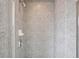 Gray tile shower with rainfall shower head at 361 17Th Nw St # 922, Atlanta, GA 30363