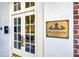 Attractive Phelan Building sign complemented by a glass paned doorway at 93 Peachtree Ne Pl # 5, Atlanta, GA 30309