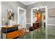 An open dining room features a contemporary design with a dining table, leading to a view of the kitchen at 93 Peachtree Ne Pl # 5, Atlanta, GA 30309