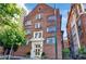 Stately brick building showcasing traditional architecture and lush greenery enhancing curb appeal at 93 Peachtree Ne Pl # 5, Atlanta, GA 30309