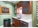 This efficient kitchen features modern amenities, wood cabinetry, and a compact setup for all culinary needs at 93 Peachtree Ne Pl # 5, Atlanta, GA 30309