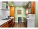 A well-organized kitchen features modern appliances, ample counter space, and wooden cabinets, perfect for cooking and storage at 93 Peachtree Ne Pl # 5, Atlanta, GA 30309
