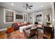 Stylishly decorated living room with warm lighting, rich textures, and hardwood floors at 93 Peachtree Ne Pl # 5, Atlanta, GA 30309