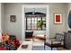 Inviting living room featuring an open doorway, neutral walls, hardwood floors, and transitional decor at 93 Peachtree Ne Pl # 5, Atlanta, GA 30309