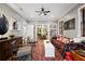 Comfortable living area with hardwood floors, built-in shelving, and doorway views to other rooms at 93 Peachtree Ne Pl # 5, Atlanta, GA 30309
