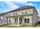 Home exterior featuring back porch and expansive backyard at 508 Clayborne Way, Loganville, GA 30052