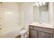 Bathroom with shower and sink with modern cabinets at 508 Clayborne Way, Loganville, GA 30052