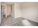 Comfortable bedroom featuring neutral carpet flooring and an ensuite bath and closet at 508 Clayborne Way, Loganville, GA 30052