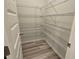 Open walk-in pantry with metal shelves, providing ample storage space at 508 Clayborne Way, Loganville, GA 30052
