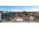 Aerial view showcasing the property's location with cityscape, nearby shops, restaurants and easy access to amenities at 650 Glen Iris Ne Dr # 27, Atlanta, GA 30308