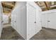 Multiple, white storage units with roll-up doors, located in a secure area at 650 Glen Iris Ne Dr # 27, Atlanta, GA 30308