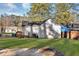 Spacious backyard featuring a small deck and well-maintained grass at 2912 Palm Dr, Atlanta, GA 30344