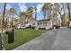 Charming single Gathering home with long driveway and well-manicured front lawn at 2912 Palm Dr, Atlanta, GA 30344