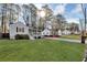 Charming single Gathering home with welcoming front porch and well-manicured front lawn at 2912 Palm Dr, Atlanta, GA 30344