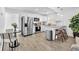 Stylish kitchen boasts stainless steel appliances, white cabinets, and granite countertops at 2912 Palm Dr, Atlanta, GA 30344