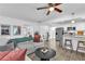 Inviting living area with views into the kitchen with stainless appliances and breakfast bar at 2912 Palm Dr, Atlanta, GA 30344