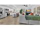 Bright, open living area flowing into the updated kitchen with stainless steel appliances at 2912 Palm Dr, Atlanta, GA 30344