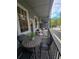 Cozy outdoor balcony featuring a dining set and view at 3165 Dogwood Dr # 106, Hapeville, GA 30354