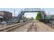 Vibrant pedestrian overpass with colorful steps stretching over active railway tracks at 3165 Dogwood Dr # 106, Hapeville, GA 30354