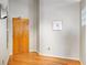 Entryway featuring hardwood floors, neutral walls, modern lighting and artwork at 3235 Roswell Ne Rd # 917, Atlanta, GA 30305