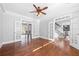 Elegant living room with hardwood floors and glass french doors to other rooms at 3819 Trotters Run, Douglasville, GA 30135