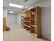 Open basement featuring built-in shelving, providing ample storage and organization options at 3854 W Nancy Creek Ne Pl, Brookhaven, GA 30319