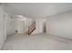 An empty living room featuring stair access to other parts of the house at 3854 W Nancy Creek Ne Pl, Brookhaven, GA 30319