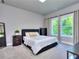 Relaxing bedroom with a bed, side tables, and plenty of natural light at 419 Mcinnes Se Cir, Marietta, GA 30060