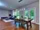 Open living space with dining area, fireplace, and view to patio at 419 Mcinnes Se Cir, Marietta, GA 30060