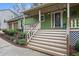 Welcoming front porch with decorative railings and stairs leading to an inviting front door at 2773 Douglas Nw Ct, Acworth, GA 30101