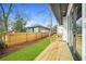 Newly built backyard with wooden fence and door leading back into the house at 1137 Hardee Ne St # B, Atlanta, GA 30307