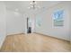 Bright bedroom with hardwood floors, two windows, and ensuite bathroom at 1137 Hardee Ne St # B, Atlanta, GA 30307