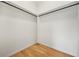 Walk-in closet with hardwood floors, minimalist design, and ample hanging space at 1137 Hardee Ne St # B, Atlanta, GA 30307