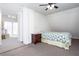 Bright bedroom with carpeted floor and neutral walls at 2370 Huckleberry Ln, Lithia Springs, GA 30122