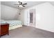 Bright bedroom with carpeted floor and ensuite bathroom at 2370 Huckleberry Ln, Lithia Springs, GA 30122