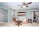 Relaxing living room includes decorative shelves and carpet flooring at 2370 Huckleberry Ln, Lithia Springs, GA 30122