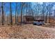 View of the property in the winter featuring a parked camper and other vehicles at 2370 Huckleberry Ln, Lithia Springs, GA 30122