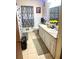 Well-lit bathroom features double sinks and tiled floors at 3750 Dial Mill Ne Rd, Conyers, GA 30013