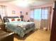 Cozy bedroom with plush carpet, comfortable bed, and soft lighting at 3750 Dial Mill Ne Rd, Conyers, GA 30013