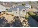 Aerial view of a home featuring a large backyard with a covered patio at 3916 Woodruff Park Way, Buford, GA 30519