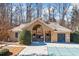 Community pool house with changing area, covered seating, and gated entry provides convenience at 3916 Woodruff Park Way, Buford, GA 30519