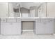 Bathroom featuring dual vanity with sleek white countertop and modern gray cabinets at 2030 Brook Meadow Dr, Alpharetta, GA 30005