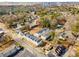 Aerial view of neighborhood with newly built townhouses surrounded by trees, showcasing the community's layout at 3165 Dogwood Dr # 108, Hapeville, GA 30354