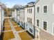 New townhomes with landscaped sidewalks and an attractive brick and siding combination at 3165 Dogwood Dr # 108, Hapeville, GA 30354