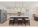 Spacious kitchen with a large island, stainless steel appliances, and stylish pendant lighting at 508 Price Rd, Carrollton, GA 30116